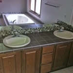 Ann Arbor Michigan bathroom sink tiles with mosaic decoration